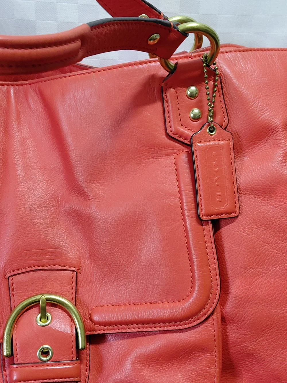 Coach Coral Leather Shoulder Tote with Front Buckle Color Salmon.